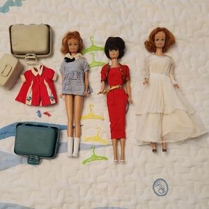 Colectable Vintage Barbie Trio with Red and White Outfits. FromThe 1960s .